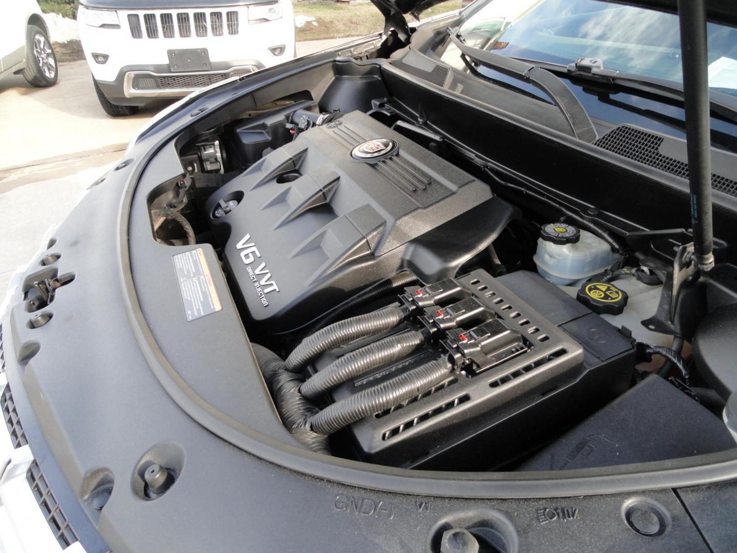 2015 Black Raven /Jet Black Cadillac SRX Performance Collection AWD (3GYFNFE32FS) with an 3.6L V6 DOHC 24V FFV engine, 6-Speed Automatic transmission, located at 827 W 26th Street, Erie, PA, 16508, (814) 455-3401, 42.105431, -80.090942 - Thanks for looking at our low mileage rust and accident-free new Toyota trade. This is the Performance model that started its journey in Florida, then it came up here in the spring of 2021 which explains the excellent condition of this vehicle along with the like new nonsmoker interior and yes, it's - Photo#44