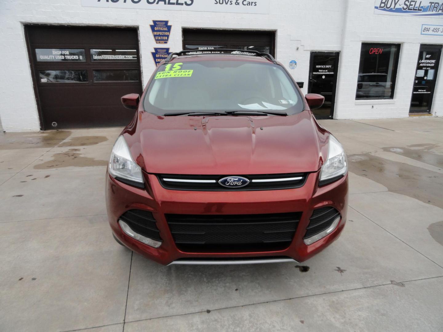 2015 Sunset Matallic /Tan Ford Escape SE FWD (1FMCU0GX6FU) with an 1.6L L4 DOHC 16V engine, 6-Speed Automatic transmission, located at 827 W 26th Street, Erie, PA, 16508, (814) 455-3401, 42.105431, -80.090942 - Photo#1