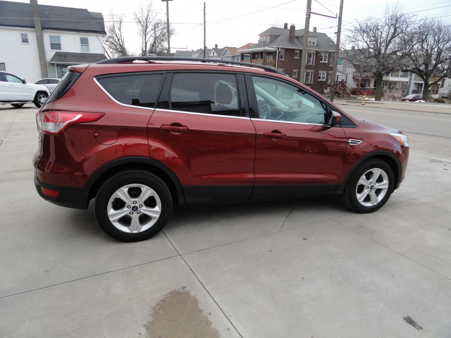 2015 Sunset Matallic /Tan Ford Escape SE FWD (1FMCU0GX6FU) with an 1.6L L4 DOHC 16V engine, 6-Speed Automatic transmission, located at 827 W 26th Street, Erie, PA, 16508, (814) 455-3401, 42.105431, -80.090942 - Photo#3