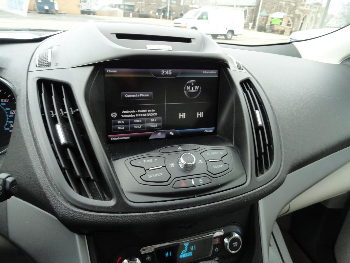 2015 Sunset Matallic /Tan Ford Escape SE FWD (1FMCU0GX6FU) with an 1.6L L4 DOHC 16V engine, 6-Speed Automatic transmission, located at 827 W 26th Street, Erie, PA, 16508, (814) 455-3401, 42.105431, -80.090942 - Photo#9