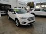 2017 White Titanium /Jet Black Ford Escape Titanium 4WD (1FMCU9JD7HU) with an 1.5L L4 DOHC 16V engine, 6-Speed Automatic transmission, located at 827 W 26th Street, Erie, PA, 16508, (814) 455-3401, 42.105431, -80.090942 - Thanks for looking at our one owner accident and rust-free new arrival. This is the top-of-the-line Titanium model with four-wheel drive, dual power heated leather front seats, remote start, back up camera, push button start, lane departure. blind spot monitor and lots more including two sets of fac - Photo#0