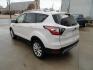 2017 White Titanium /Jet Black Ford Escape Titanium 4WD (1FMCU9JD7HU) with an 1.5L L4 DOHC 16V engine, 6-Speed Automatic transmission, located at 827 W 26th Street, Erie, PA, 16508, (814) 455-3401, 42.105431, -80.090942 - Thanks for looking at our one owner accident and rust-free new arrival. This is the top-of-the-line Titanium model with four-wheel drive, dual power heated leather front seats, remote start, back up camera, push button start, lane departure. blind spot monitor and lots more including two sets of fac - Photo#5