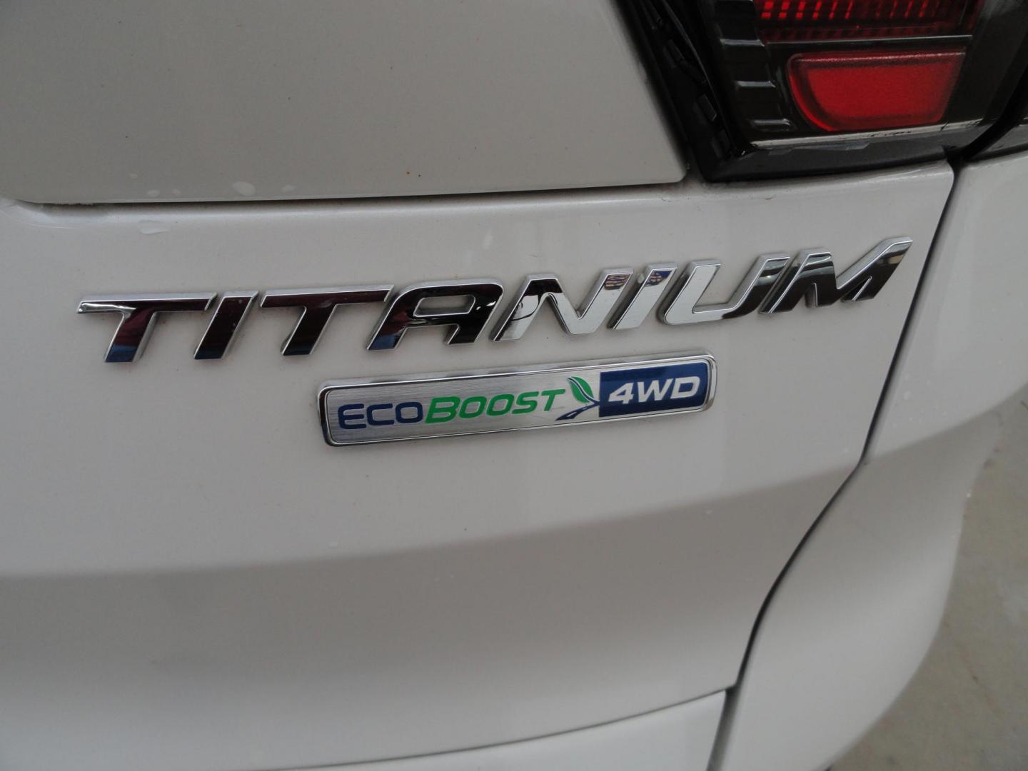 2017 White Titanium /Jet Black Ford Escape Titanium 4WD (1FMCU9JD7HU) with an 1.5L L4 DOHC 16V engine, 6-Speed Automatic transmission, located at 827 W 26th Street, Erie, PA, 16508, (814) 455-3401, 42.105431, -80.090942 - Thanks for looking at our one owner accident and rust-free new arrival. This is the top-of-the-line Titanium model with four-wheel drive, dual power heated leather front seats, remote start, back up camera, push button start, lane departure. blind spot monitor and lots more including two sets of fac - Photo#8