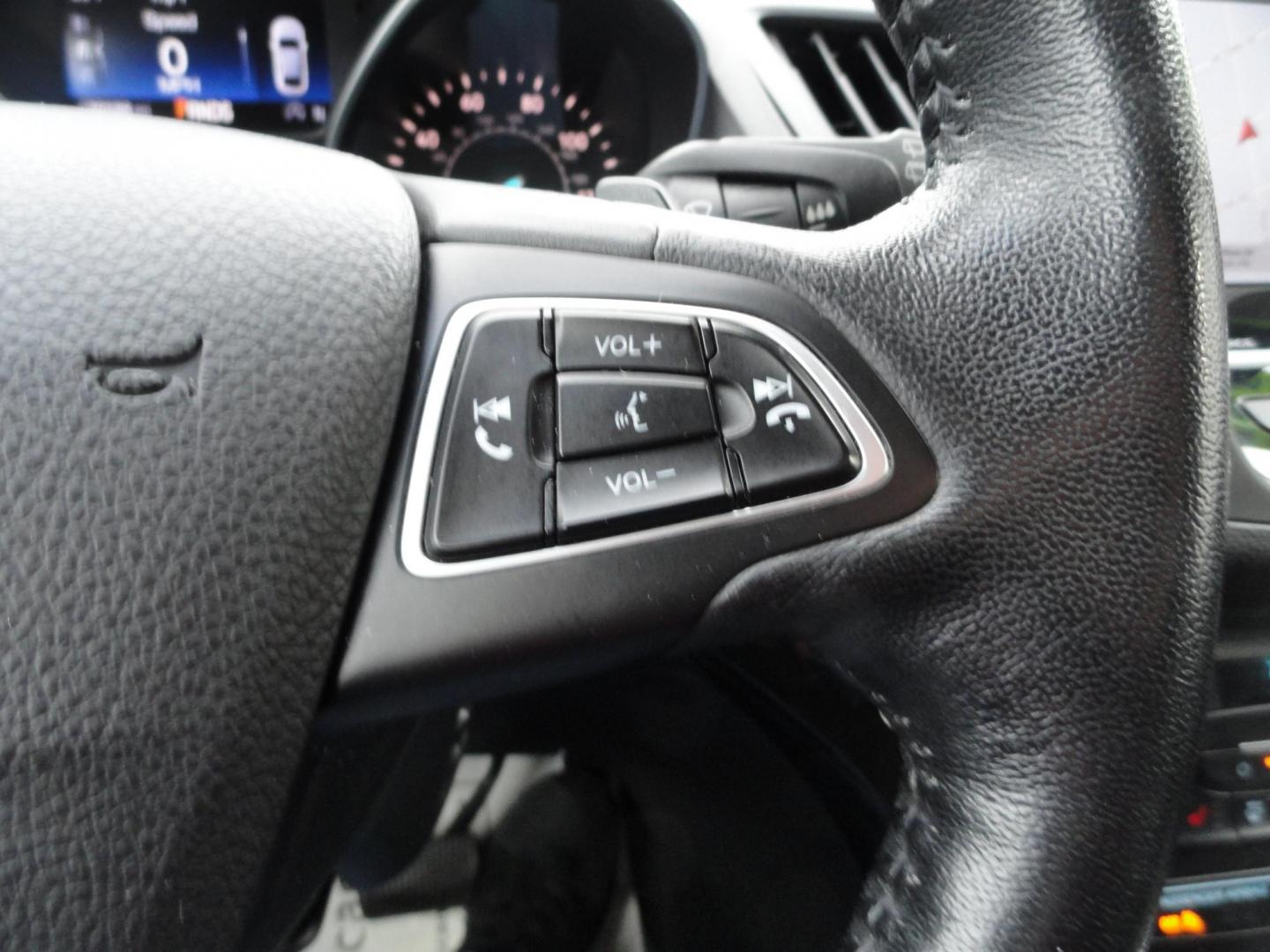 2017 White Titanium /Jet Black Ford Escape Titanium 4WD (1FMCU9JD7HU) with an 1.5L L4 DOHC 16V engine, 6-Speed Automatic transmission, located at 827 W 26th Street, Erie, PA, 16508, (814) 455-3401, 42.105431, -80.090942 - Thanks for looking at our one owner accident and rust-free new arrival. This is the top-of-the-line Titanium model with four-wheel drive, dual power heated leather front seats, remote start, back up camera, push button start, lane departure. blind spot monitor and lots more including two sets of fac - Photo#20