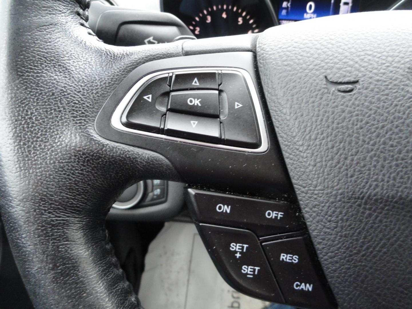 2017 White Titanium /Jet Black Ford Escape Titanium 4WD (1FMCU9JD7HU) with an 1.5L L4 DOHC 16V engine, 6-Speed Automatic transmission, located at 827 W 26th Street, Erie, PA, 16508, (814) 455-3401, 42.105431, -80.090942 - Thanks for looking at our one owner accident and rust-free new arrival. This is the top-of-the-line Titanium model with four-wheel drive, dual power heated leather front seats, remote start, back up camera, push button start, lane departure. blind spot monitor and lots more including two sets of fac - Photo#21