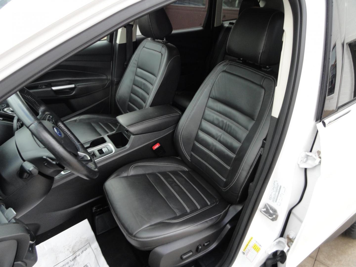 2017 White Titanium /Jet Black Ford Escape Titanium 4WD (1FMCU9JD7HU) with an 1.5L L4 DOHC 16V engine, 6-Speed Automatic transmission, located at 827 W 26th Street, Erie, PA, 16508, (814) 455-3401, 42.105431, -80.090942 - Thanks for looking at our one owner accident and rust-free new arrival. This is the top-of-the-line Titanium model with four-wheel drive, dual power heated leather front seats, remote start, back up camera, push button start, lane departure. blind spot monitor and lots more including two sets of fac - Photo#28