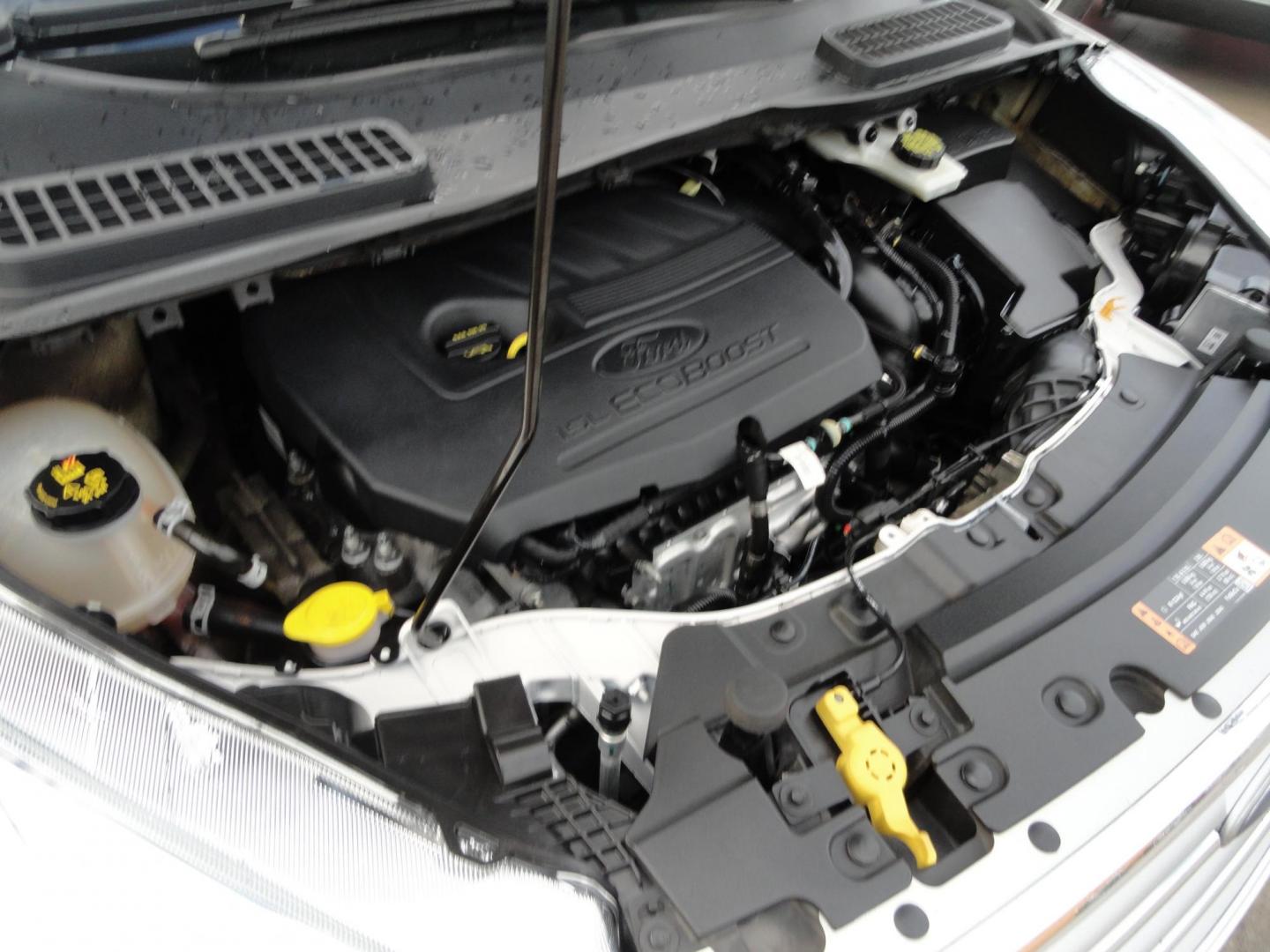 2017 White Titanium /Jet Black Ford Escape Titanium 4WD (1FMCU9JD7HU) with an 1.5L L4 DOHC 16V engine, 6-Speed Automatic transmission, located at 827 W 26th Street, Erie, PA, 16508, (814) 455-3401, 42.105431, -80.090942 - Thanks for looking at our one owner accident and rust-free new arrival. This is the top-of-the-line Titanium model with four-wheel drive, dual power heated leather front seats, remote start, back up camera, push button start, lane departure. blind spot monitor and lots more including two sets of fac - Photo#48