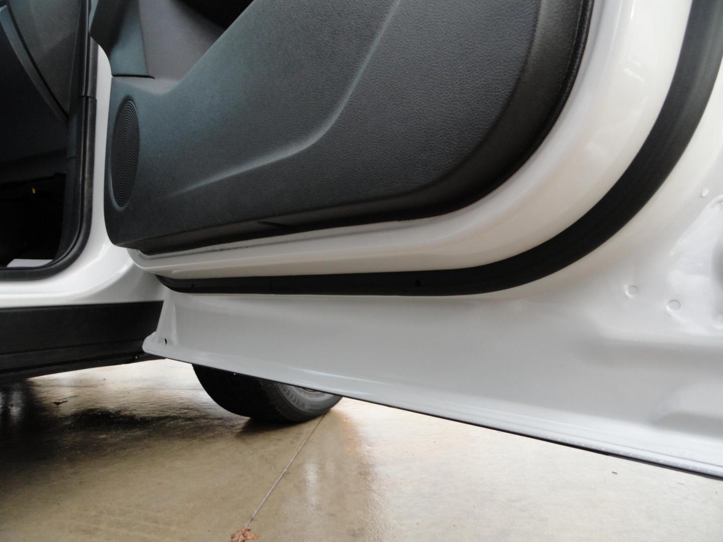 2017 White Titanium /Jet Black Ford Escape Titanium 4WD (1FMCU9JD7HU) with an 1.5L L4 DOHC 16V engine, 6-Speed Automatic transmission, located at 827 W 26th Street, Erie, PA, 16508, (814) 455-3401, 42.105431, -80.090942 - Thanks for looking at our one owner accident and rust-free new arrival. This is the top-of-the-line Titanium model with four-wheel drive, dual power heated leather front seats, remote start, back up camera, push button start, lane departure. blind spot monitor and lots more including two sets of fac - Photo#47