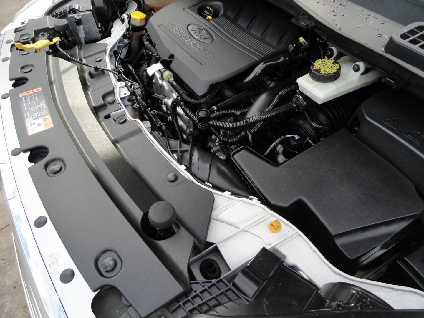 2017 White Titanium /Jet Black Ford Escape Titanium 4WD (1FMCU9JD7HU) with an 1.5L L4 DOHC 16V engine, 6-Speed Automatic transmission, located at 827 W 26th Street, Erie, PA, 16508, (814) 455-3401, 42.105431, -80.090942 - Thanks for looking at our one owner accident and rust-free new arrival. This is the top-of-the-line Titanium model with four-wheel drive, dual power heated leather front seats, remote start, back up camera, push button start, lane departure. blind spot monitor and lots more including two sets of fac - Photo#50