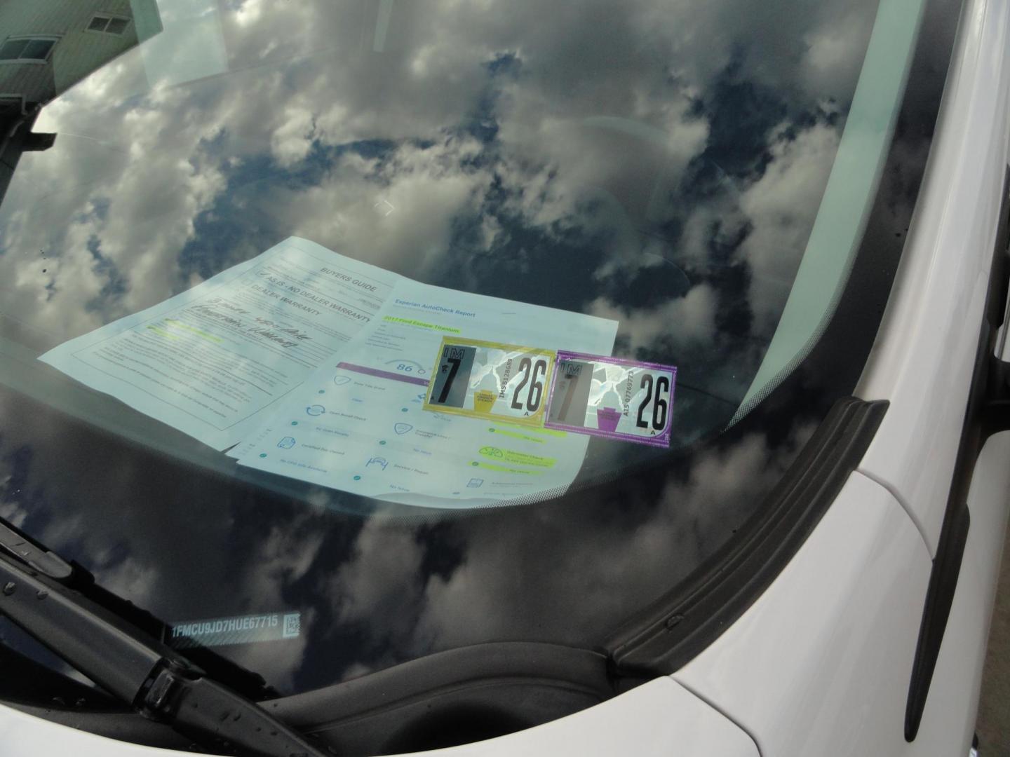 2017 White Titanium /Jet Black Ford Escape Titanium 4WD (1FMCU9JD7HU) with an 1.5L L4 DOHC 16V engine, 6-Speed Automatic transmission, located at 827 W 26th Street, Erie, PA, 16508, (814) 455-3401, 42.105431, -80.090942 - Thanks for looking at our one owner accident and rust-free new arrival. This is the top-of-the-line Titanium model with four-wheel drive, dual power heated leather front seats, remote start, back up camera, push button start, lane departure. blind spot monitor and lots more including two sets of fac - Photo#53