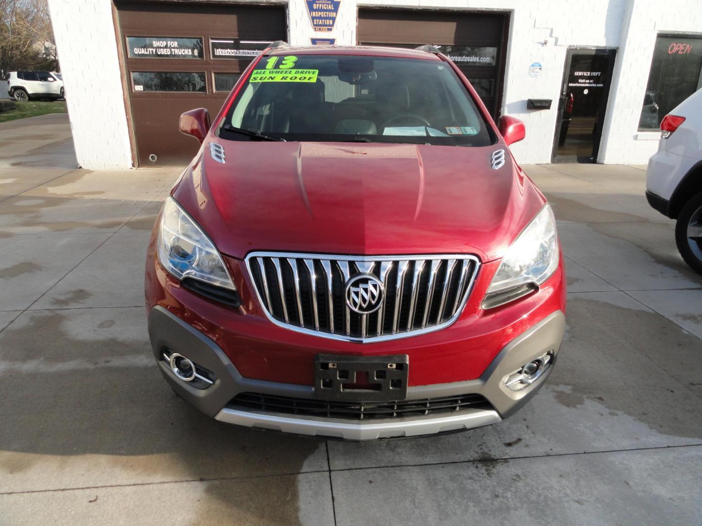 2013 Ruby Red Metallic /Jet Black Buick Encore Convenience AWD (KL4CJFSB0DB) with an 1.4L L4 DOHC 16V TURBO engine, 6-Speed Automatic transmission, located at 827 W 26th Street, Erie, PA, 16508, (814) 455-3401, 42.105431, -80.090942 - Thanks for looking at our low mileage extra clean rust-free new arrival. This is the convenance package with all wheel drive, power sunroof, leather seats, remote start, rear camera and lots more. A full service was just completed in our service department with new Pa state and emissions inspection - Photo#1