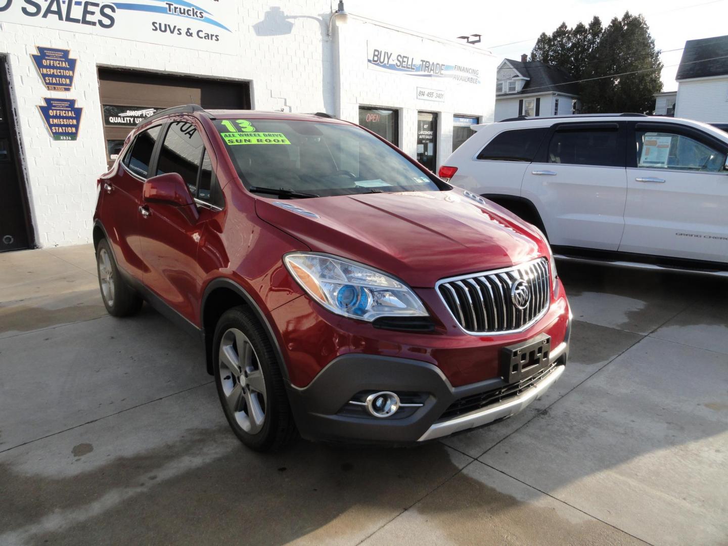 2013 Ruby Red Metallic /Jet Black Buick Encore Convenience AWD (KL4CJFSB0DB) with an 1.4L L4 DOHC 16V TURBO engine, 6-Speed Automatic transmission, located at 827 W 26th Street, Erie, PA, 16508, (814) 455-3401, 42.105431, -80.090942 - Thanks for looking at our low mileage extra clean rust-free new arrival. This is the convenance package with all wheel drive, power sunroof, leather seats, remote start, rear camera and lots more. A full service was just completed in our service department with new Pa state and emissions inspection - Photo#0