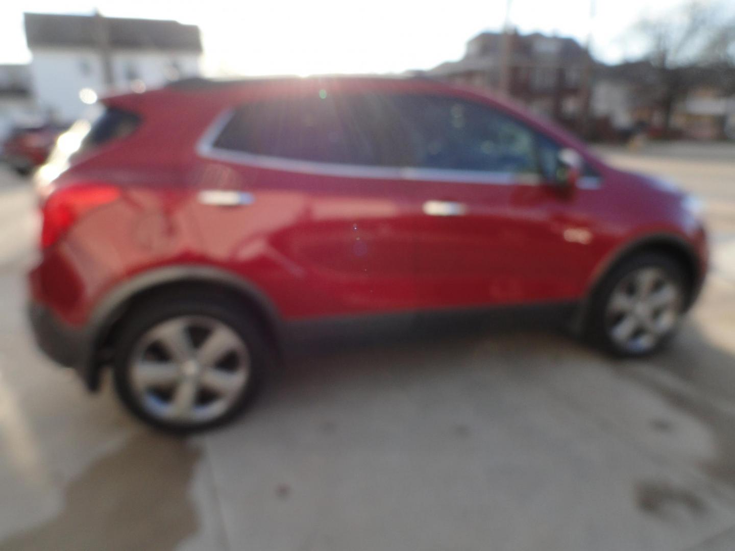 2013 Ruby Red Metallic /Jet Black Buick Encore Convenience AWD (KL4CJFSB0DB) with an 1.4L L4 DOHC 16V TURBO engine, 6-Speed Automatic transmission, located at 827 W 26th Street, Erie, PA, 16508, (814) 455-3401, 42.105431, -80.090942 - Thanks for looking at our low mileage extra clean rust-free new arrival. This is the convenance package with all wheel drive, power sunroof, leather seats, remote start, rear camera and lots more. A full service was just completed in our service department with new Pa state and emissions inspection - Photo#3