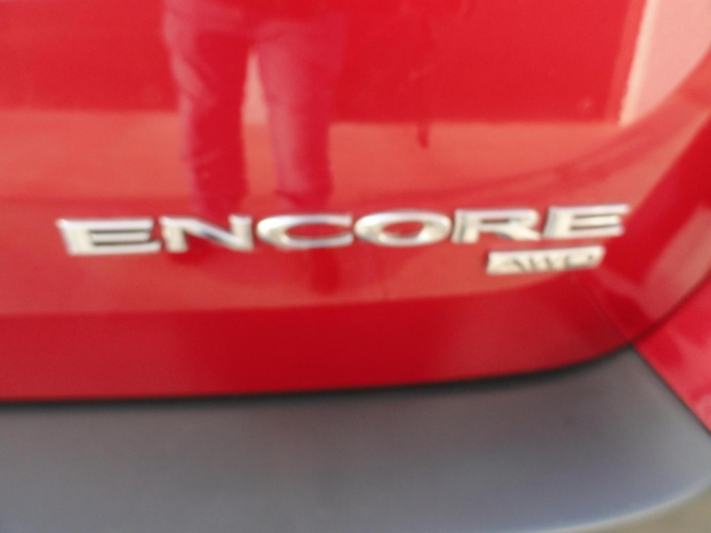 2013 Ruby Red Metallic /Jet Black Buick Encore Convenience AWD (KL4CJFSB0DB) with an 1.4L L4 DOHC 16V TURBO engine, 6-Speed Automatic transmission, located at 827 W 26th Street, Erie, PA, 16508, (814) 455-3401, 42.105431, -80.090942 - Thanks for looking at our low mileage extra clean rust-free new arrival. This is the convenance package with all wheel drive, power sunroof, leather seats, remote start, rear camera and lots more. A full service was just completed in our service department with new Pa state and emissions inspection - Photo#7