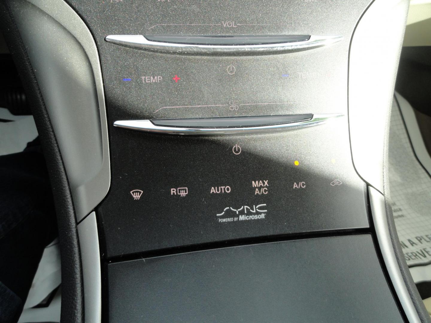 2015 Ruby Red Metallic /Tan Lincoln MKZ Hybrid Sedan (3LN6L2LU5FR) with an 2.0L L4 DOHC 16V HYBRID engine, Continuously Variable Transmission transmission, located at 827 W 26th Street, Erie, PA, 16508, (814) 455-3401, 42.105431, -80.090942 - Thanks for looking at our low mileage great on gas recent trade in. This is the Hybrid edition with lots of options in like new condition with a great exterior as well as a like new interior plus it comes with both keyless remotes, remote start and the factory owner's manuals. A full service was jus - Photo#13