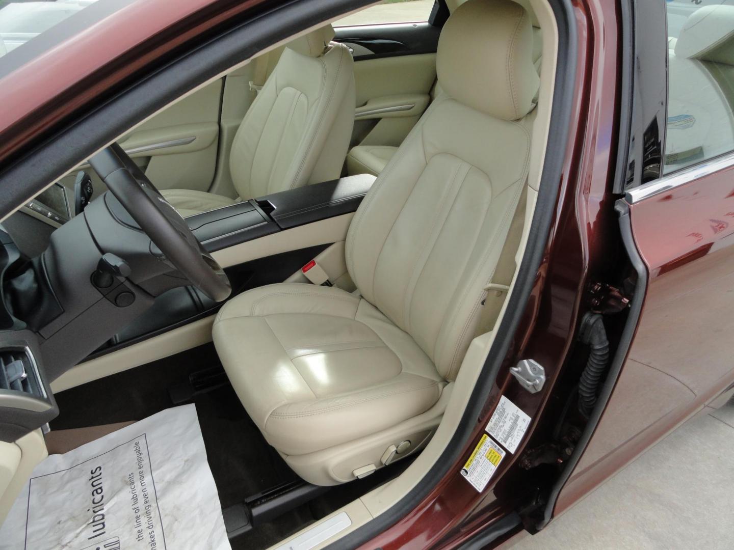 2015 Ruby Red Metallic /Tan Lincoln MKZ Hybrid Sedan (3LN6L2LU5FR) with an 2.0L L4 DOHC 16V HYBRID engine, Continuously Variable Transmission transmission, located at 827 W 26th Street, Erie, PA, 16508, (814) 455-3401, 42.105431, -80.090942 - Thanks for looking at our low mileage great on gas recent trade in. This is the Hybrid edition with lots of options in like new condition with a great exterior as well as a like new interior plus it comes with both keyless remotes, remote start and the factory owner's manuals. A full service was jus - Photo#18