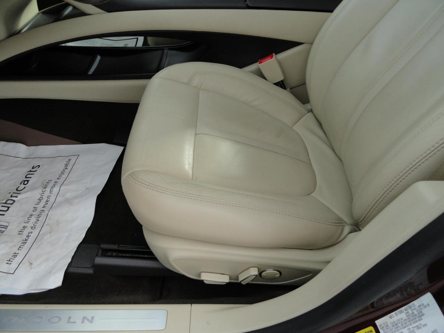 2015 Ruby Red Metallic /Tan Lincoln MKZ Hybrid Sedan (3LN6L2LU5FR) with an 2.0L L4 DOHC 16V HYBRID engine, Continuously Variable Transmission transmission, located at 827 W 26th Street, Erie, PA, 16508, (814) 455-3401, 42.105431, -80.090942 - Thanks for looking at our low mileage great on gas recent trade in. This is the Hybrid edition with lots of options in like new condition with a great exterior as well as a like new interior plus it comes with both keyless remotes, remote start and the factory owner's manuals. A full service was jus - Photo#19