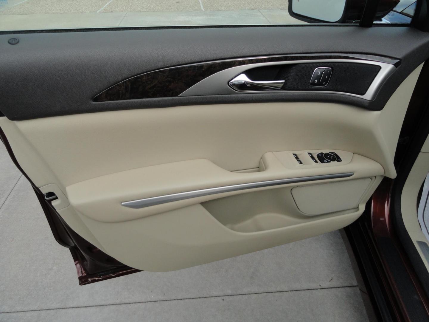 2015 Ruby Red Metallic /Tan Lincoln MKZ Hybrid Sedan (3LN6L2LU5FR) with an 2.0L L4 DOHC 16V HYBRID engine, Continuously Variable Transmission transmission, located at 827 W 26th Street, Erie, PA, 16508, (814) 455-3401, 42.105431, -80.090942 - Thanks for looking at our low mileage great on gas recent trade in. This is the Hybrid edition with lots of options in like new condition with a great exterior as well as a like new interior plus it comes with both keyless remotes, remote start and the factory owner's manuals. A full service was jus - Photo#20