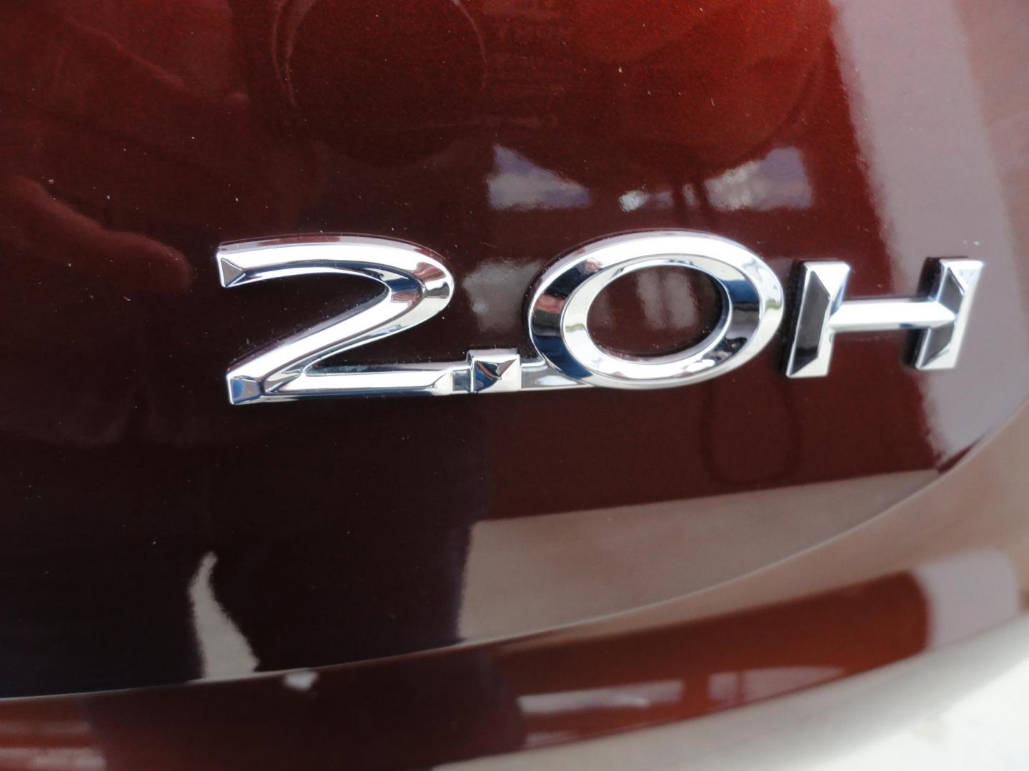 2015 Ruby Red Metallic /Tan Lincoln MKZ Hybrid Sedan (3LN6L2LU5FR) with an 2.0L L4 DOHC 16V HYBRID engine, Continuously Variable Transmission transmission, located at 827 W 26th Street, Erie, PA, 16508, (814) 455-3401, 42.105431, -80.090942 - Thanks for looking at our low mileage great on gas recent trade in. This is the Hybrid edition with lots of options in like new condition with a great exterior as well as a like new interior plus it comes with both keyless remotes, remote start and the factory owner's manuals. A full service was jus - Photo#25