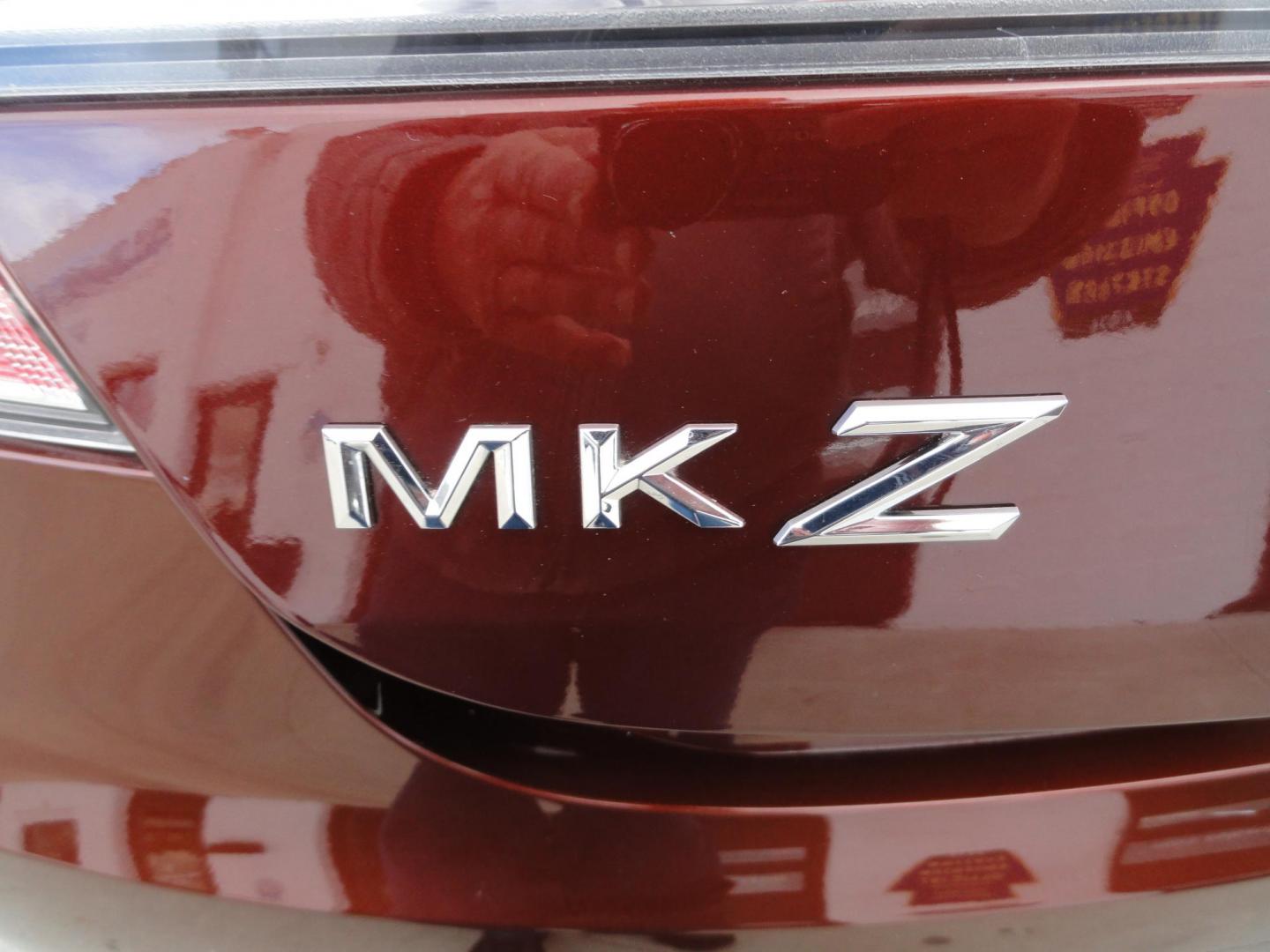 2015 Ruby Red Metallic /Tan Lincoln MKZ Hybrid Sedan (3LN6L2LU5FR) with an 2.0L L4 DOHC 16V HYBRID engine, Continuously Variable Transmission transmission, located at 827 W 26th Street, Erie, PA, 16508, (814) 455-3401, 42.105431, -80.090942 - Thanks for looking at our low mileage great on gas recent trade in. This is the Hybrid edition with lots of options in like new condition with a great exterior as well as a like new interior plus it comes with both keyless remotes, remote start and the factory owner's manuals. A full service was jus - Photo#24