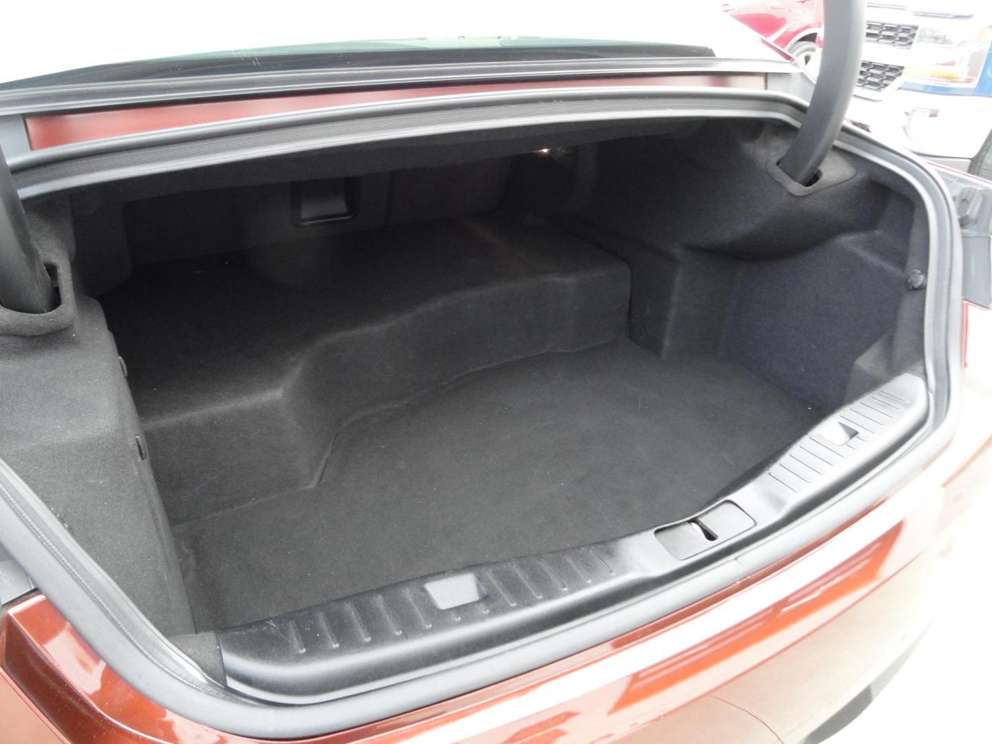 2015 Ruby Red Metallic /Tan Lincoln MKZ Hybrid Sedan (3LN6L2LU5FR) with an 2.0L L4 DOHC 16V HYBRID engine, Continuously Variable Transmission transmission, located at 827 W 26th Street, Erie, PA, 16508, (814) 455-3401, 42.105431, -80.090942 - Thanks for looking at our low mileage great on gas recent trade in. This is the Hybrid edition with lots of options in like new condition with a great exterior as well as a like new interior plus it comes with both keyless remotes, remote start and the factory owner's manuals. A full service was jus - Photo#26