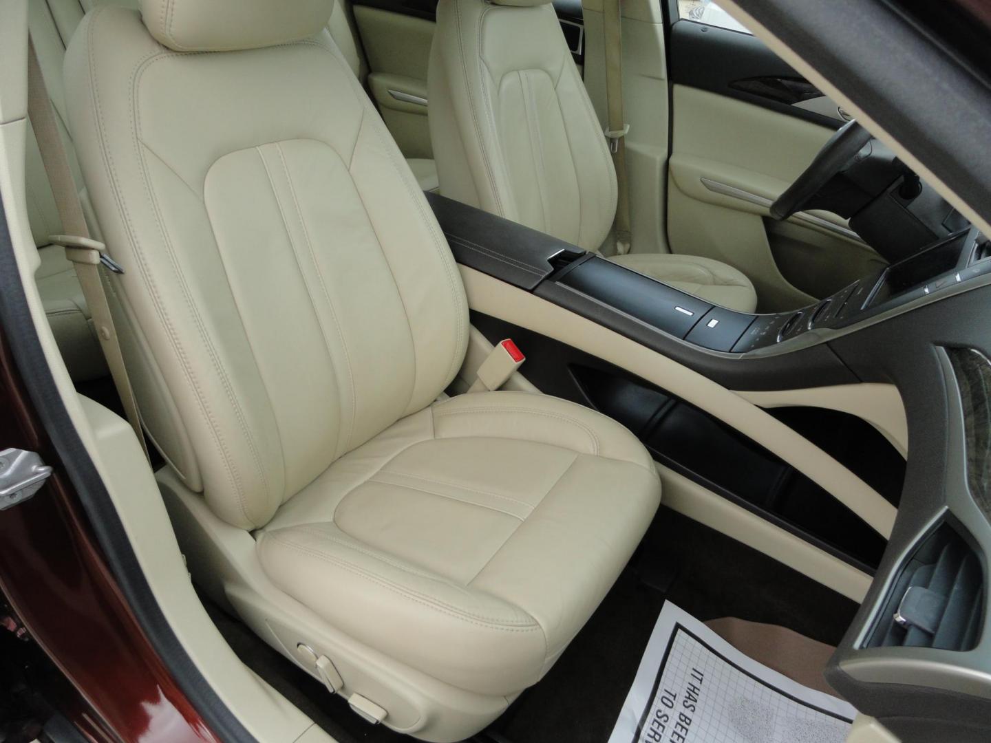 2015 Ruby Red Metallic /Tan Lincoln MKZ Hybrid Sedan (3LN6L2LU5FR) with an 2.0L L4 DOHC 16V HYBRID engine, Continuously Variable Transmission transmission, located at 827 W 26th Street, Erie, PA, 16508, (814) 455-3401, 42.105431, -80.090942 - Thanks for looking at our low mileage great on gas recent trade in. This is the Hybrid edition with lots of options in like new condition with a great exterior as well as a like new interior plus it comes with both keyless remotes, remote start and the factory owner's manuals. A full service was jus - Photo#29