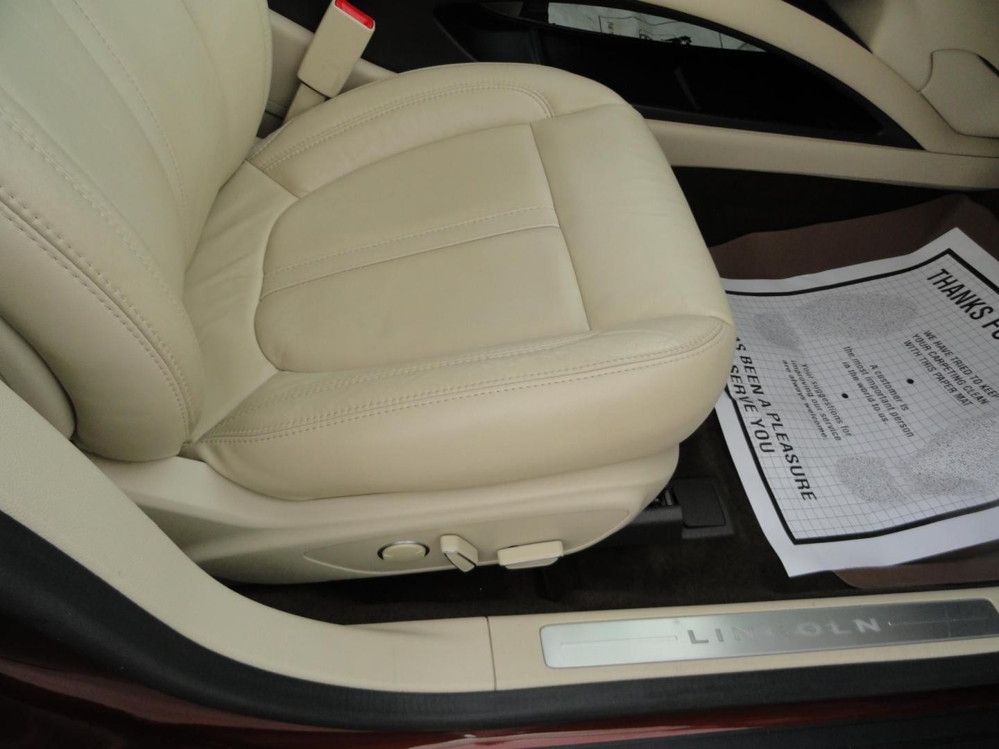 2015 Ruby Red Metallic /Tan Lincoln MKZ Hybrid Sedan (3LN6L2LU5FR) with an 2.0L L4 DOHC 16V HYBRID engine, Continuously Variable Transmission transmission, located at 827 W 26th Street, Erie, PA, 16508, (814) 455-3401, 42.105431, -80.090942 - Thanks for looking at our low mileage great on gas recent trade in. This is the Hybrid edition with lots of options in like new condition with a great exterior as well as a like new interior plus it comes with both keyless remotes, remote start and the factory owner's manuals. A full service was jus - Photo#30