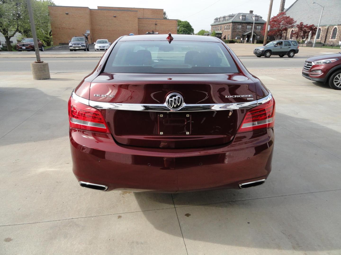 2016 Baroque Red Metallic /Graphite Buick LaCrosse Leather Package AWD (1G4GC5G34GF) with an 3.6L V6 DOHC 24V FFV engine, 6-Speed Automatic transmission, located at 827 W 26th Street, Erie, PA, 16508, (814) 455-3401, 42.105431, -80.090942 - Thank for looking at our two-owner new Chevrolet trade in. This is the Premium with leather all-wheel drive model with heated leather, keyless entry, back up camera, push button start and lots more. We've been servicing this vehicle since 30,000 miles for the previous customer who took excellent car - Photo#4