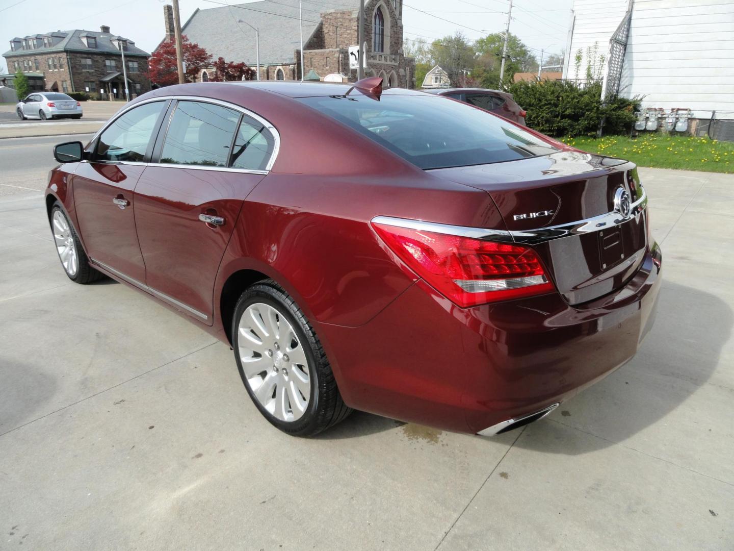 2016 Baroque Red Metallic /Graphite Buick LaCrosse Leather Package AWD (1G4GC5G34GF) with an 3.6L V6 DOHC 24V FFV engine, 6-Speed Automatic transmission, located at 827 W 26th Street, Erie, PA, 16508, (814) 455-3401, 42.105431, -80.090942 - Thank for looking at our two-owner new Chevrolet trade in. This is the Premium with leather all-wheel drive model with heated leather, keyless entry, back up camera, push button start and lots more. We've been servicing this vehicle since 30,000 miles for the previous customer who took excellent car - Photo#5