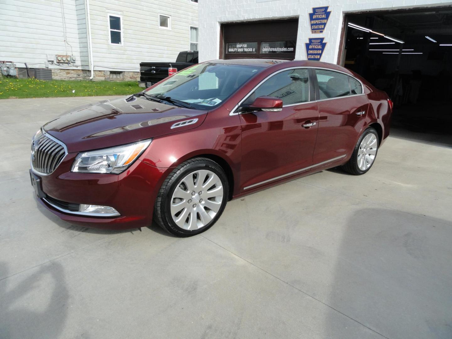 2016 Baroque Red Metallic /Graphite Buick LaCrosse Leather Package AWD (1G4GC5G34GF) with an 3.6L V6 DOHC 24V FFV engine, 6-Speed Automatic transmission, located at 827 W 26th Street, Erie, PA, 16508, (814) 455-3401, 42.105431, -80.090942 - Thank for looking at our two-owner new Chevrolet trade in. This is the Premium with leather all-wheel drive model with heated leather, keyless entry, back up camera, push button start and lots more. We've been servicing this vehicle since 30,000 miles for the previous customer who took excellent car - Photo#6