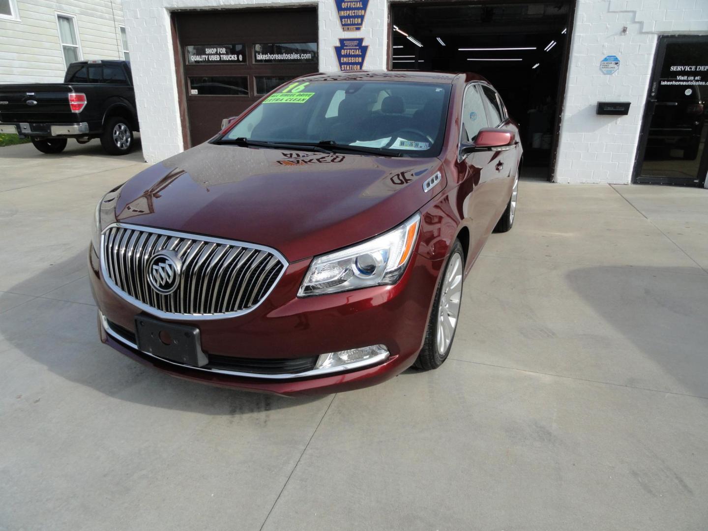 2016 Baroque Red Metallic /Graphite Buick LaCrosse Leather Package AWD (1G4GC5G34GF) with an 3.6L V6 DOHC 24V FFV engine, 6-Speed Automatic transmission, located at 827 W 26th Street, Erie, PA, 16508, (814) 455-3401, 42.105431, -80.090942 - Thank for looking at our two-owner new Chevrolet trade in. This is the Premium with leather all-wheel drive model with heated leather, keyless entry, back up camera, push button start and lots more. We've been servicing this vehicle since 30,000 miles for the previous customer who took excellent car - Photo#7