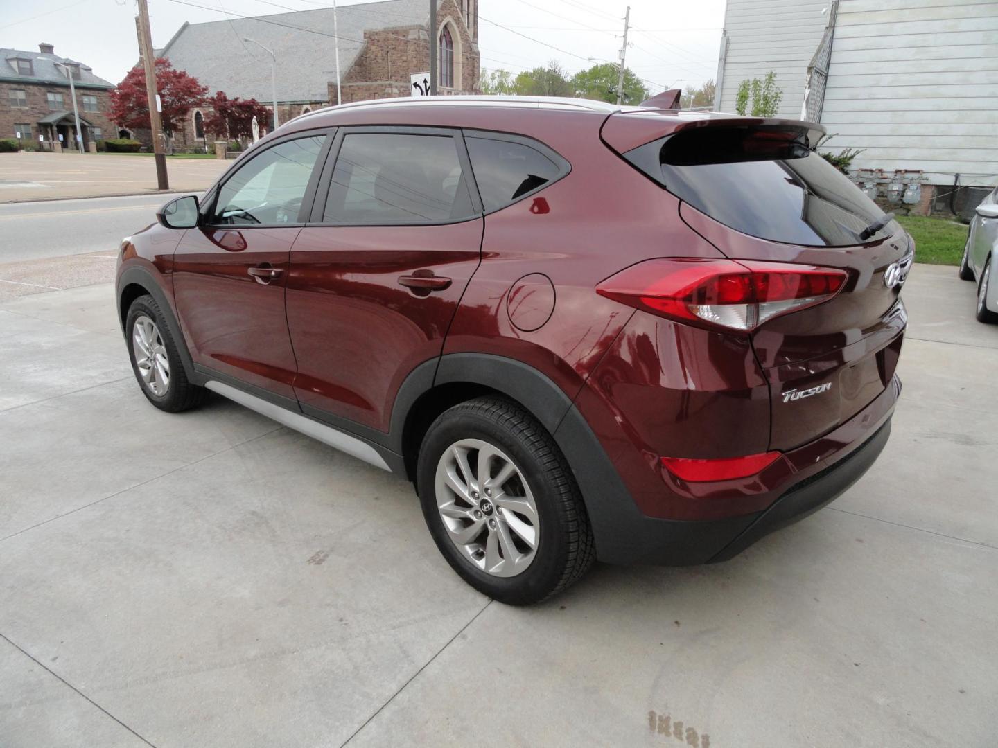 2018 Ruby Wine /Beige Hyundai Tucson SE AWD (KM8J3CA45JU) with an 2.0L L4 DOHC 16V engine, 6-Speed Automatic transmission, located at 827 W 26th Street, Erie, PA, 16508, (814) 455-3401, 42.105431, -80.090942 - Thanks for looking at our super clean rust and accident-free recent arrival. This is the Se ALL WHEEL DRIVE model with lots of options including a power drivers seat, keyless entry, Bluetooth, and lots more. A full service was just completed in our service department with new Pa state and emissions - Photo#5
