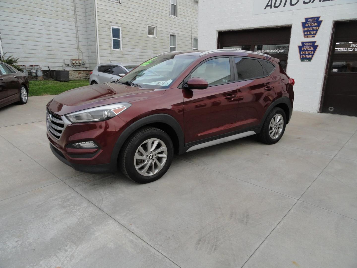 2018 Ruby Wine /Beige Hyundai Tucson SE AWD (KM8J3CA45JU) with an 2.0L L4 DOHC 16V engine, 6-Speed Automatic transmission, located at 827 W 26th Street, Erie, PA, 16508, (814) 455-3401, 42.105431, -80.090942 - Thanks for looking at our super clean rust and accident-free recent arrival. This is the Se ALL WHEEL DRIVE model with lots of options including a power drivers seat, keyless entry, Bluetooth, and lots more. A full service was just completed in our service department with new Pa state and emissions - Photo#6
