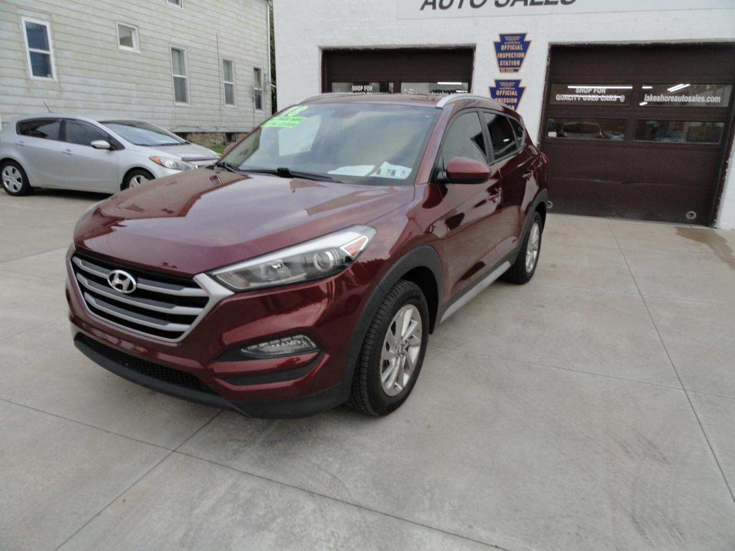 2018 Ruby Wine /Beige Hyundai Tucson SE AWD (KM8J3CA45JU) with an 2.0L L4 DOHC 16V engine, 6-Speed Automatic transmission, located at 827 W 26th Street, Erie, PA, 16508, (814) 455-3401, 42.105431, -80.090942 - Thanks for looking at our super clean rust and accident-free recent arrival. This is the Se ALL WHEEL DRIVE model with lots of options including a power drivers seat, keyless entry, Bluetooth, and lots more. A full service was just completed in our service department with new Pa state and emissions - Photo#7