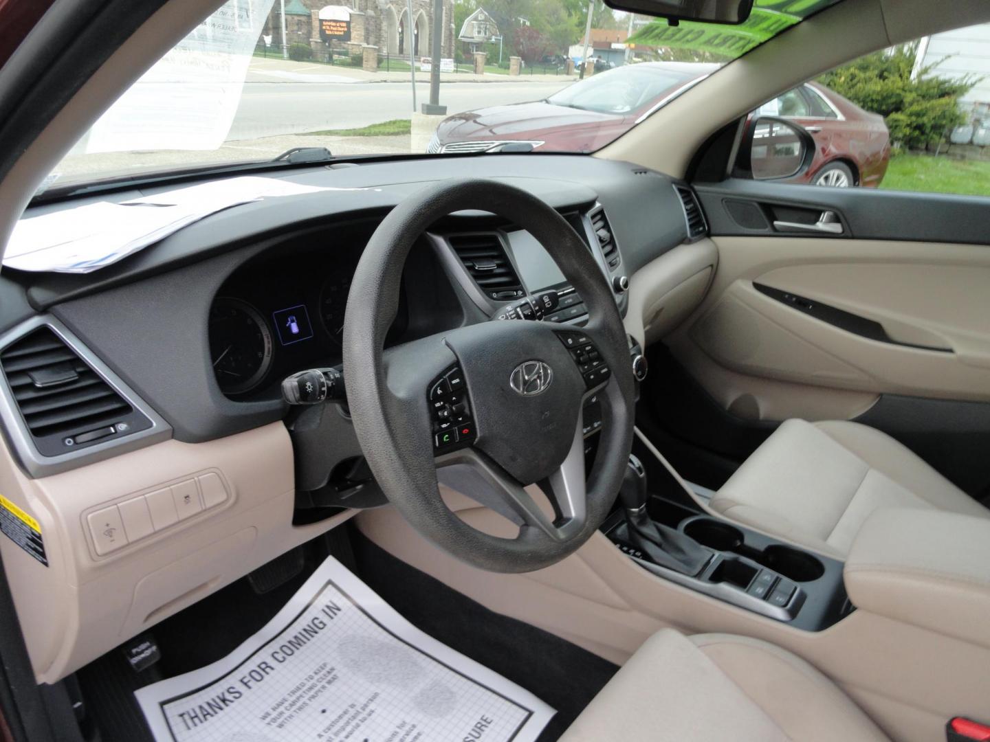 2018 Ruby Wine /Beige Hyundai Tucson SE AWD (KM8J3CA45JU) with an 2.0L L4 DOHC 16V engine, 6-Speed Automatic transmission, located at 827 W 26th Street, Erie, PA, 16508, (814) 455-3401, 42.105431, -80.090942 - Thanks for looking at our super clean rust and accident-free recent arrival. This is the Se ALL WHEEL DRIVE model with lots of options including a power drivers seat, keyless entry, Bluetooth, and lots more. A full service was just completed in our service department with new Pa state and emissions - Photo#19