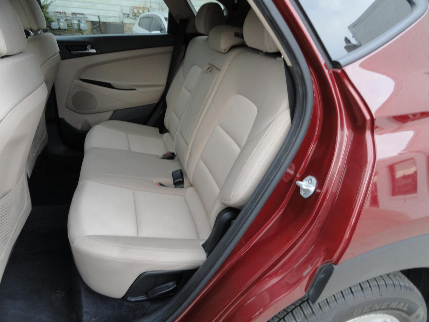 2018 Ruby Wine /Beige Hyundai Tucson SE AWD (KM8J3CA45JU) with an 2.0L L4 DOHC 16V engine, 6-Speed Automatic transmission, located at 827 W 26th Street, Erie, PA, 16508, (814) 455-3401, 42.105431, -80.090942 - Thanks for looking at our super clean rust and accident-free recent arrival. This is the Se ALL WHEEL DRIVE model with lots of options including a power drivers seat, keyless entry, Bluetooth, and lots more. A full service was just completed in our service department with new Pa state and emissions - Photo#23