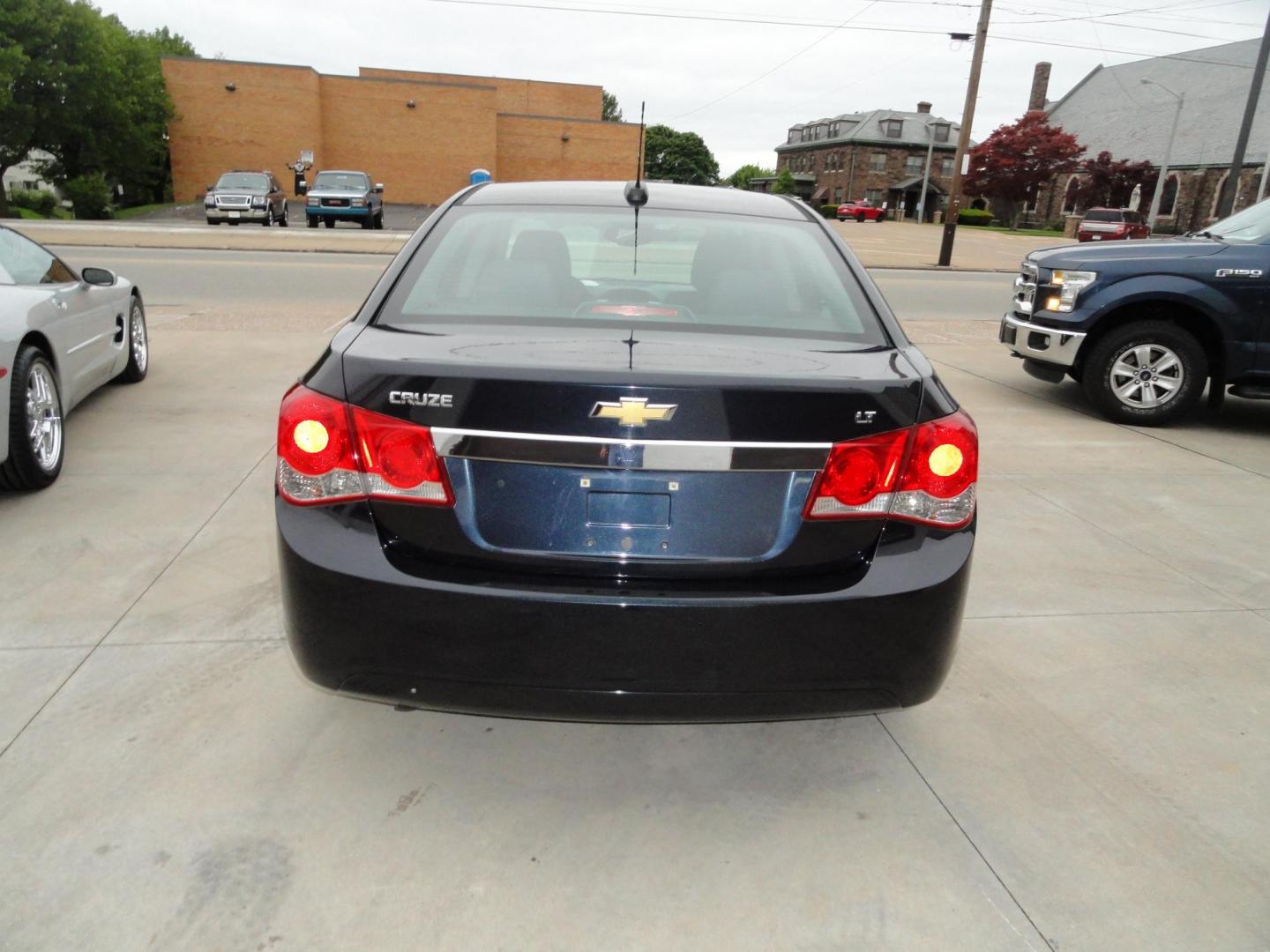 2015 Blue Ray Metallic /Graphite Chevrolet Cruze 1LT Auto (1G1PC5SB9F7) with an 1.4L L4 DOHC 16V TURBO engine, 6-Speed Automatic transmission, located at 827 W 26th Street, Erie, PA, 16508, (814) 455-3401, 42.105431, -80.090942 - Thanks for looking at Grandma's low mileage like new accident-free new Chevy trade. This is the LT model with lots of toys including a power drivers seat, factory remote start, Bluetooth, XM radio and lots more. A full service was just completed in our service department with new Pa state and emissi - Photo#4