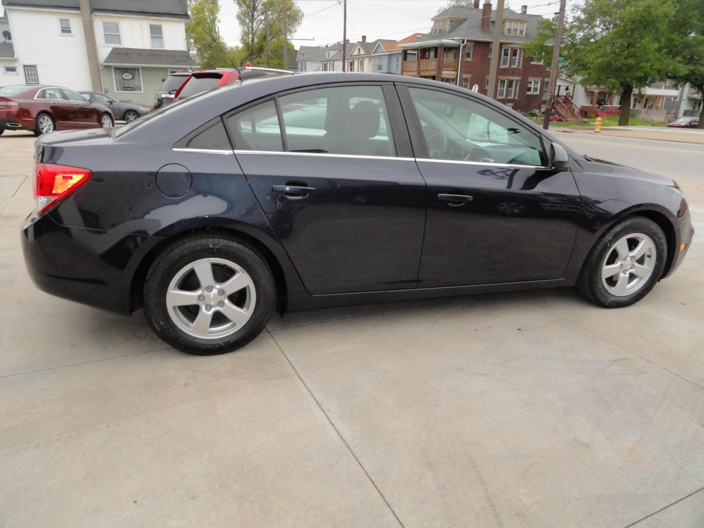 2015 Blue Ray Metallic /Graphite Chevrolet Cruze 1LT Auto (1G1PC5SB9F7) with an 1.4L L4 DOHC 16V TURBO engine, 6-Speed Automatic transmission, located at 827 W 26th Street, Erie, PA, 16508, (814) 455-3401, 42.105431, -80.090942 - Thanks for looking at Grandma's low mileage like new accident-free new Chevy trade. This is the LT model with lots of toys including a power drivers seat, factory remote start, Bluetooth, XM radio and lots more. A full service was just completed in our service department with new Pa state and emissi - Photo#3