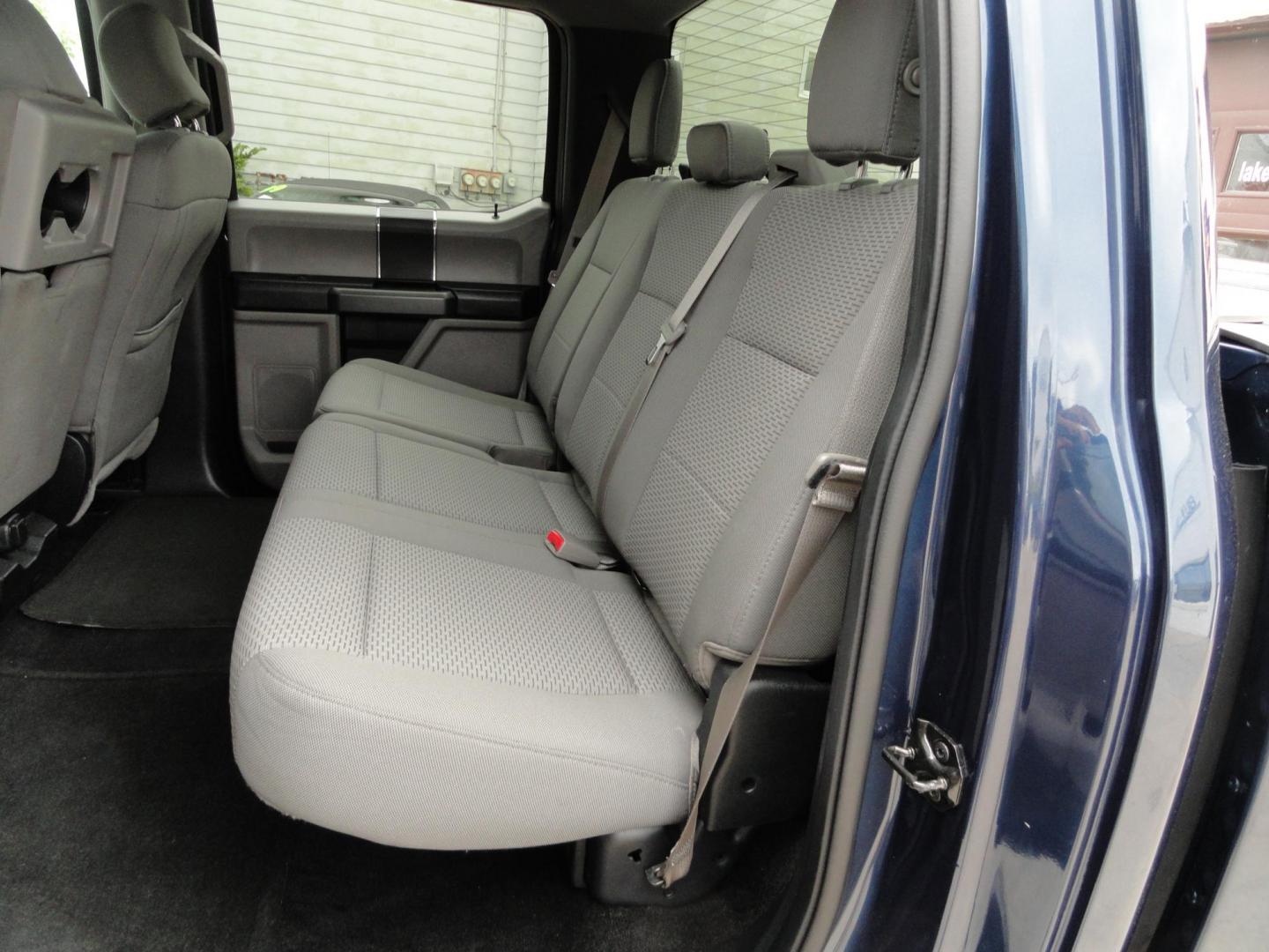 2016 Blue Jean Metallic /Greystone Ford F-150 XLT SuperCrew 6.5-ft. Bed 4WD (1FTEW1EF4GF) with an 5.0L V8 engine, 6 Automatic transmission, located at 827 W 26th Street, Erie, PA, 16508, (814) 455-3401, 42.105431, -80.090942 - Thanks for looking at our one owner low mileage rust free new arrival. This truck had its roots in southern Virginia which explains the like new rust-free exterior with no rust anywhere. The under carriage is also in extra nice condition along with a like new nonsmoker interior. This is the XLT mod - Photo#32