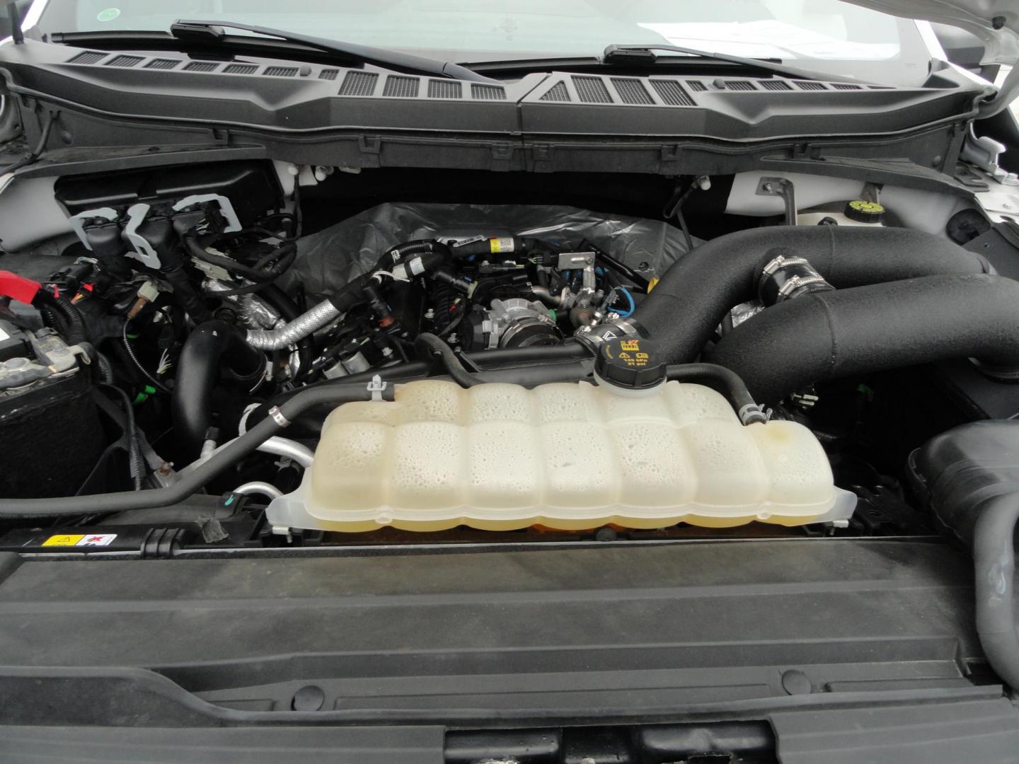 2022 Oxford White /Black Sport Ford F-150 XLT SuperCrew 6.5-ft. Bed 4WD (1FTEW1EP2NF) with an 2.7L V6 DOHC 24V engine, 10 Speed Automatic transmission, located at 827 W 26th Street, Erie, PA, 16508, (814) 455-3401, 42.105431, -80.090942 - Thanks for looking at our two-owner low mileage accident-free new Ford Trade. This is the XLT Super Crew model with the Sport 4X4 option which includes tons of options including dual power front seats, Bluetooth, remote start, push button start, blind spot monitor rear camera and tons more. This tr - Photo#54