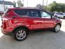 2018 Ruby Red Metallic /Greystone Ford Escape SE 4WD (1FMCU9GD1JU) with an 1.5L L4 DOHC 16V engine, 6A transmission, located at 827 W 26th Street, Erie, PA, 16508, (814) 455-3401, 42.105431, -80.090942 - Thanks for looking at our low mileage accident free one owner new vehicle trade. This is the SE model with all wheel drive, power drivers seat, Bluetooth and lots more including both keys and remotes, the owner's manuals and the original floor mats. A full service was just completed in our service d - Photo#3