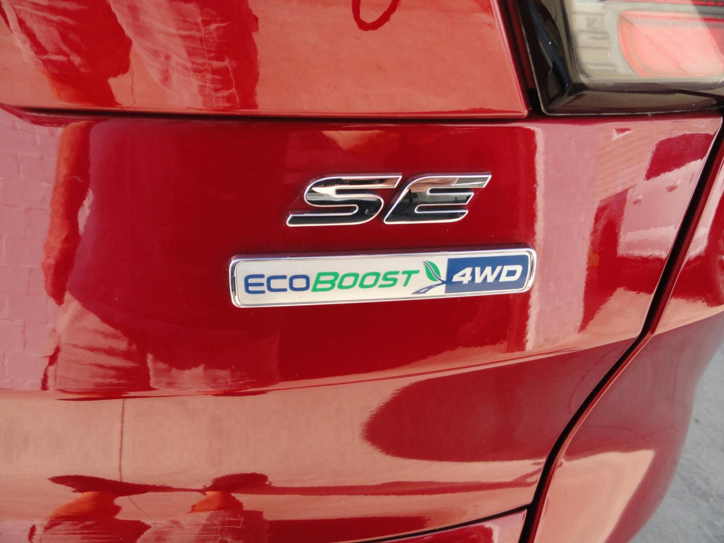 2018 Ruby Red Metallic /Greystone Ford Escape SE 4WD (1FMCU9GD1JU) with an 1.5L L4 DOHC 16V engine, 6A transmission, located at 827 W 26th Street, Erie, PA, 16508, (814) 455-3401, 42.105431, -80.090942 - Thanks for looking at our low mileage accident free one owner new vehicle trade. This is the SE model with all wheel drive, power drivers seat, Bluetooth and lots more including both keys and remotes, the owner's manuals and the original floor mats. A full service was just completed in our service d - Photo#8