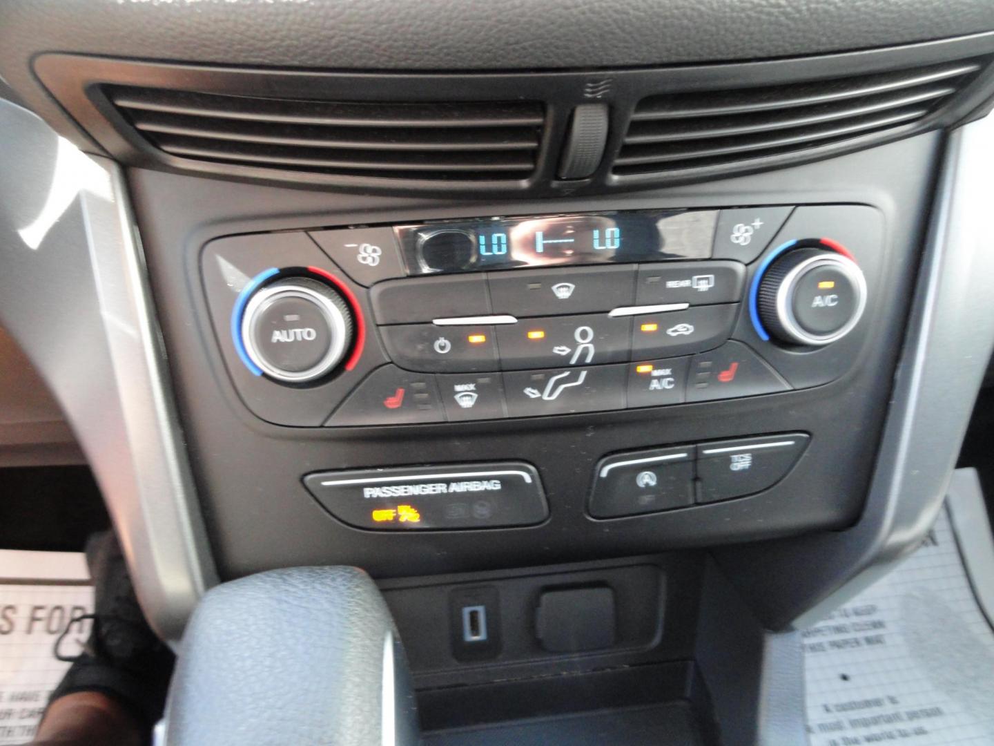 2018 Ruby Red Metallic /Greystone Ford Escape SE 4WD (1FMCU9GD1JU) with an 1.5L L4 DOHC 16V engine, 6A transmission, located at 827 W 26th Street, Erie, PA, 16508, (814) 455-3401, 42.105431, -80.090942 - Thanks for looking at our low mileage accident free one owner new vehicle trade. This is the SE model with all wheel drive, power drivers seat, Bluetooth and lots more including both keys and remotes, the owner's manuals and the original floor mats. A full service was just completed in our service d - Photo#14