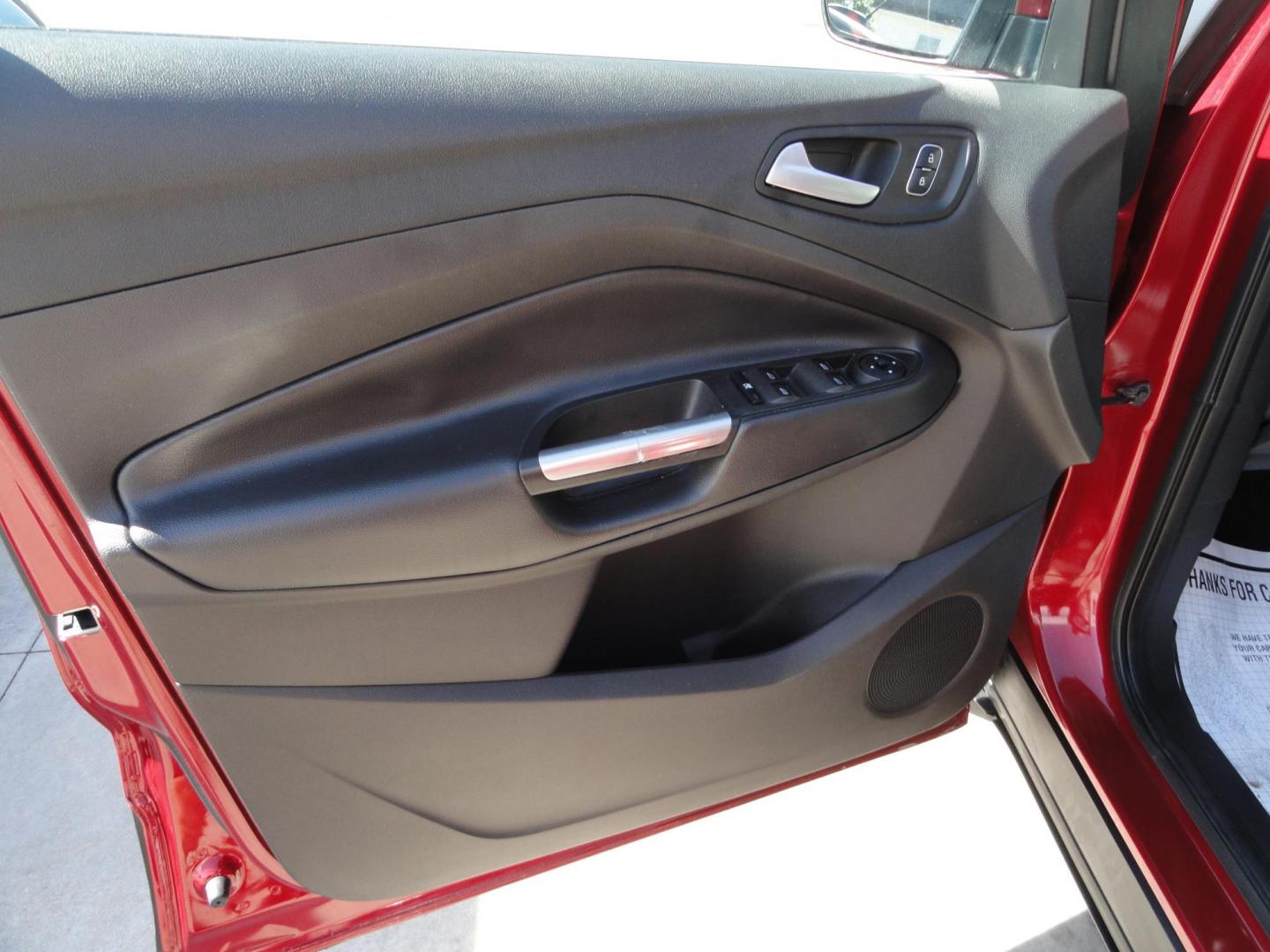 2018 Ruby Red Metallic /Greystone Ford Escape SE 4WD (1FMCU9GD1JU) with an 1.5L L4 DOHC 16V engine, 6A transmission, located at 827 W 26th Street, Erie, PA, 16508, (814) 455-3401, 42.105431, -80.090942 - Thanks for looking at our low mileage accident free one owner new vehicle trade. This is the SE model with all wheel drive, power drivers seat, Bluetooth and lots more including both keys and remotes, the owner's manuals and the original floor mats. A full service was just completed in our service d - Photo#25