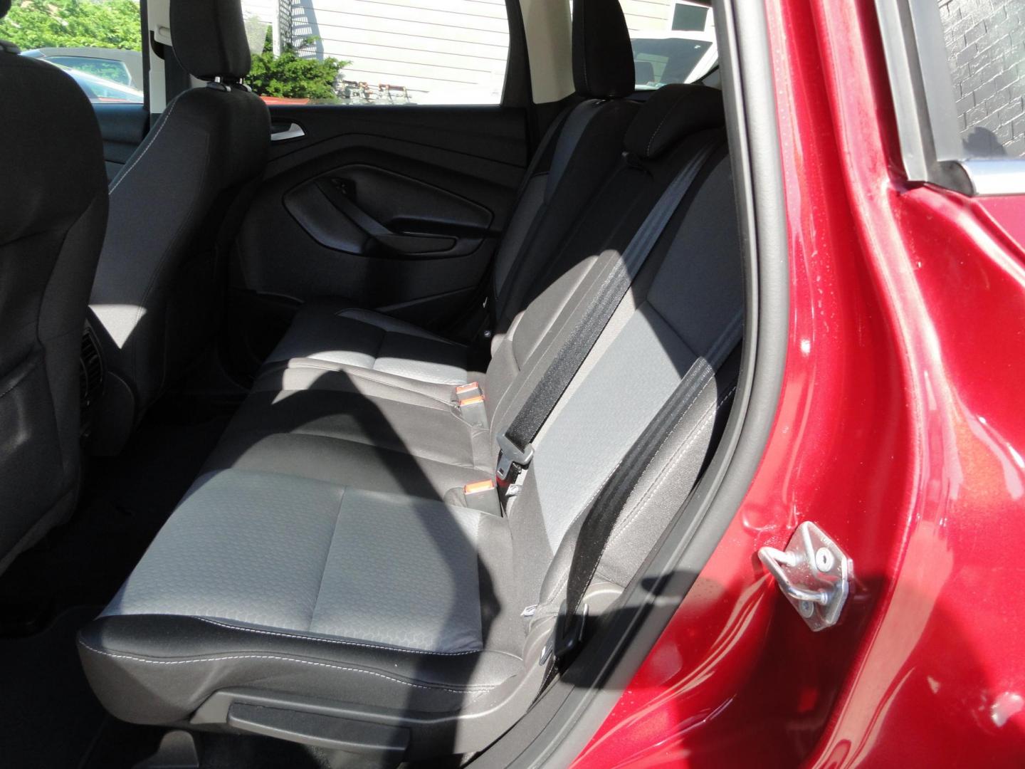 2018 Ruby Red Metallic /Greystone Ford Escape SE 4WD (1FMCU9GD1JU) with an 1.5L L4 DOHC 16V engine, 6A transmission, located at 827 W 26th Street, Erie, PA, 16508, (814) 455-3401, 42.105431, -80.090942 - Thanks for looking at our low mileage accident free one owner new vehicle trade. This is the SE model with all wheel drive, power drivers seat, Bluetooth and lots more including both keys and remotes, the owner's manuals and the original floor mats. A full service was just completed in our service d - Photo#27