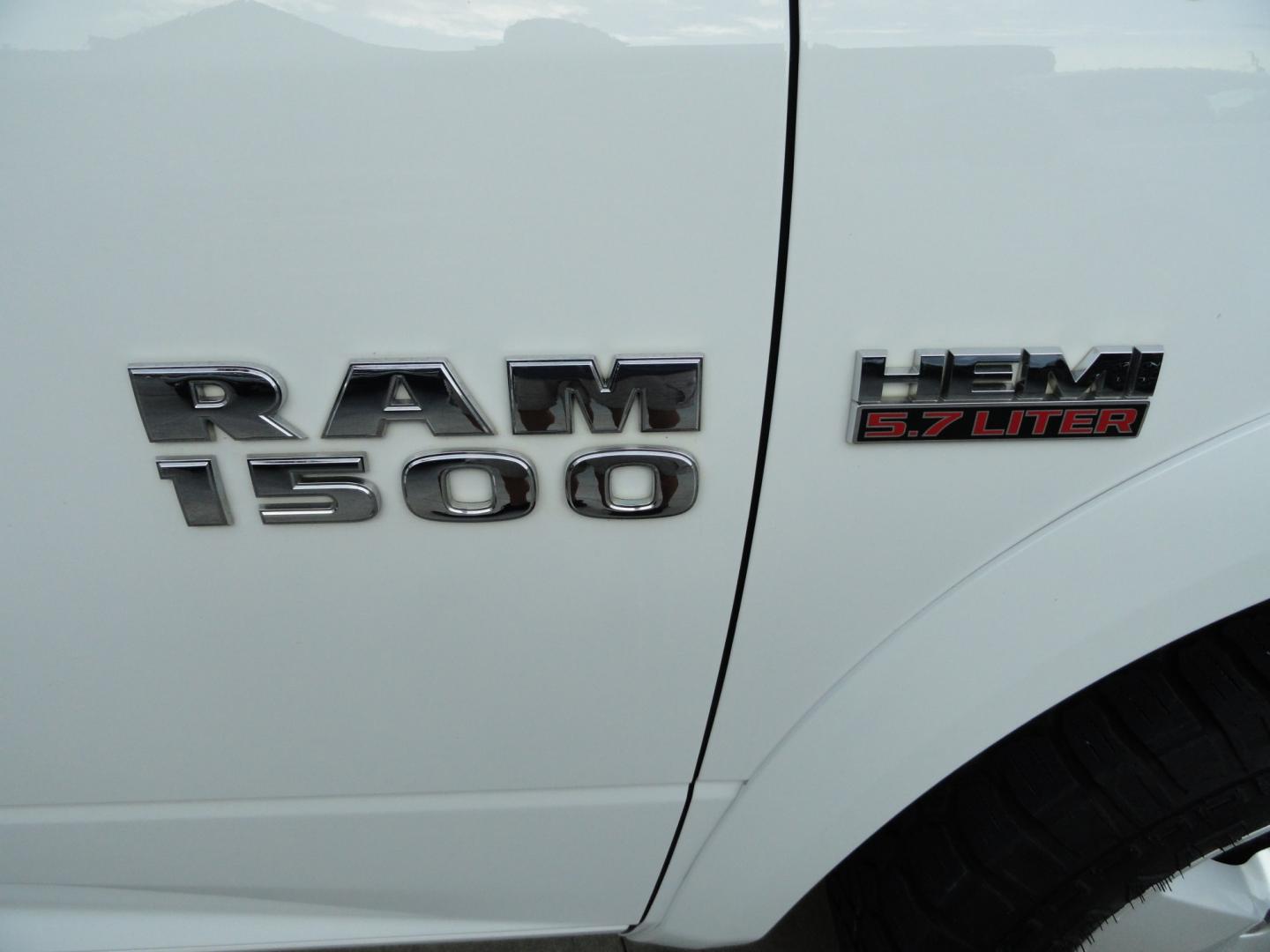 2013 Bright White /Greystone RAM 1500 Express Regular Cab SWB 4WD (3C6JR7AT0DG) with an 5.7L V8 OHV 16V engine, 6-Speed Automatic transmission, located at 827 W 26th Street, Erie, PA, 16508, (814) 455-3401, 42.105431, -80.090942 - Thanks for looking at our low mileage super clean recent Chevy trade in. This is the Express model 1500 with the Hemi V-8, four-wheel drive, remote entry and lots more. This is a super clean truck with a great exterior and like new interior and as you know these short bed pickups in this condition- Photo#3