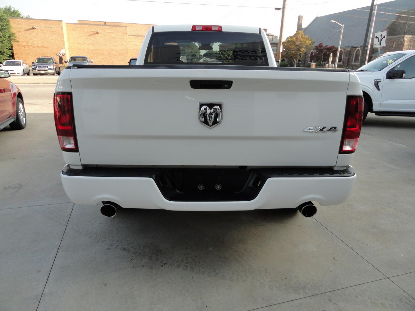 2013 Bright White /Greystone RAM 1500 Express Regular Cab SWB 4WD (3C6JR7AT0DG) with an 5.7L V8 OHV 16V engine, 6-Speed Automatic transmission, located at 827 W 26th Street, Erie, PA, 16508, (814) 455-3401, 42.105431, -80.090942 - Thanks for looking at our low mileage super clean recent Chevy trade in. This is the Express model 1500 with the Hemi V-8, four-wheel drive, remote entry and lots more. This is a super clean truck with a great exterior and like new interior and as you know these short bed pickups in this condition- Photo#5