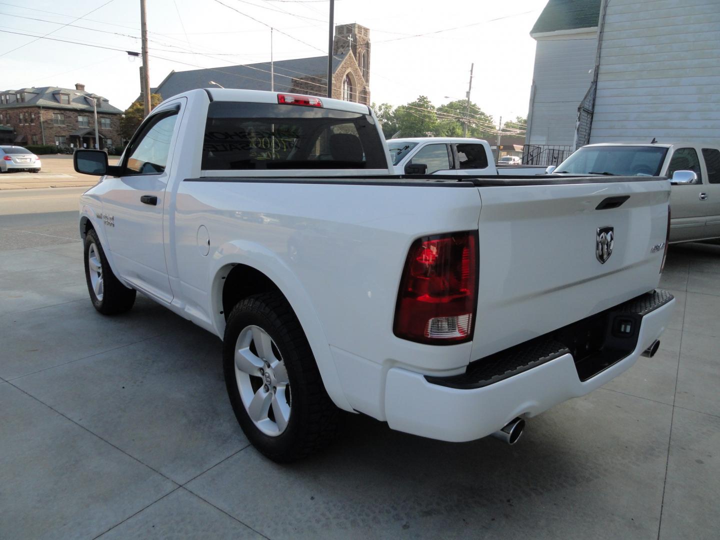 2013 Bright White /Greystone RAM 1500 Express Regular Cab SWB 4WD (3C6JR7AT0DG) with an 5.7L V8 OHV 16V engine, 6-Speed Automatic transmission, located at 827 W 26th Street, Erie, PA, 16508, (814) 455-3401, 42.105431, -80.090942 - Thanks for looking at our low mileage super clean recent Chevy trade in. This is the Express model 1500 with the Hemi V-8, four-wheel drive, remote entry and lots more. This is a super clean truck with a great exterior and like new interior and as you know these short bed pickups in this condition- Photo#6