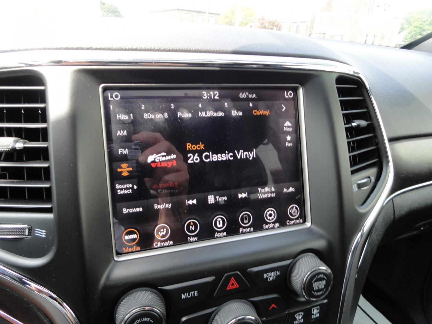 2018 Bright White /Jet Black Jeep Grand Cherokee Limited 4WD (1C4RJFBT2JC) with an 5.7L V8 OHV 16V engine, 8 SPEED AUTOMATIC transmission, located at 827 W 26th Street, Erie, PA, 16508, (814) 455-3401, 42.105431, -80.090942 - Thanks for looking at our two-owner accident and rust-free recent arrival. This is the Limited model with the hard-to-find HEMI 5.7 V-8 engine, four-wheel drive, dual power heated front seats, leather seating areas, back up camera, navigation, power sunroof, power lift gate, remote start, keyless en- Photo#10