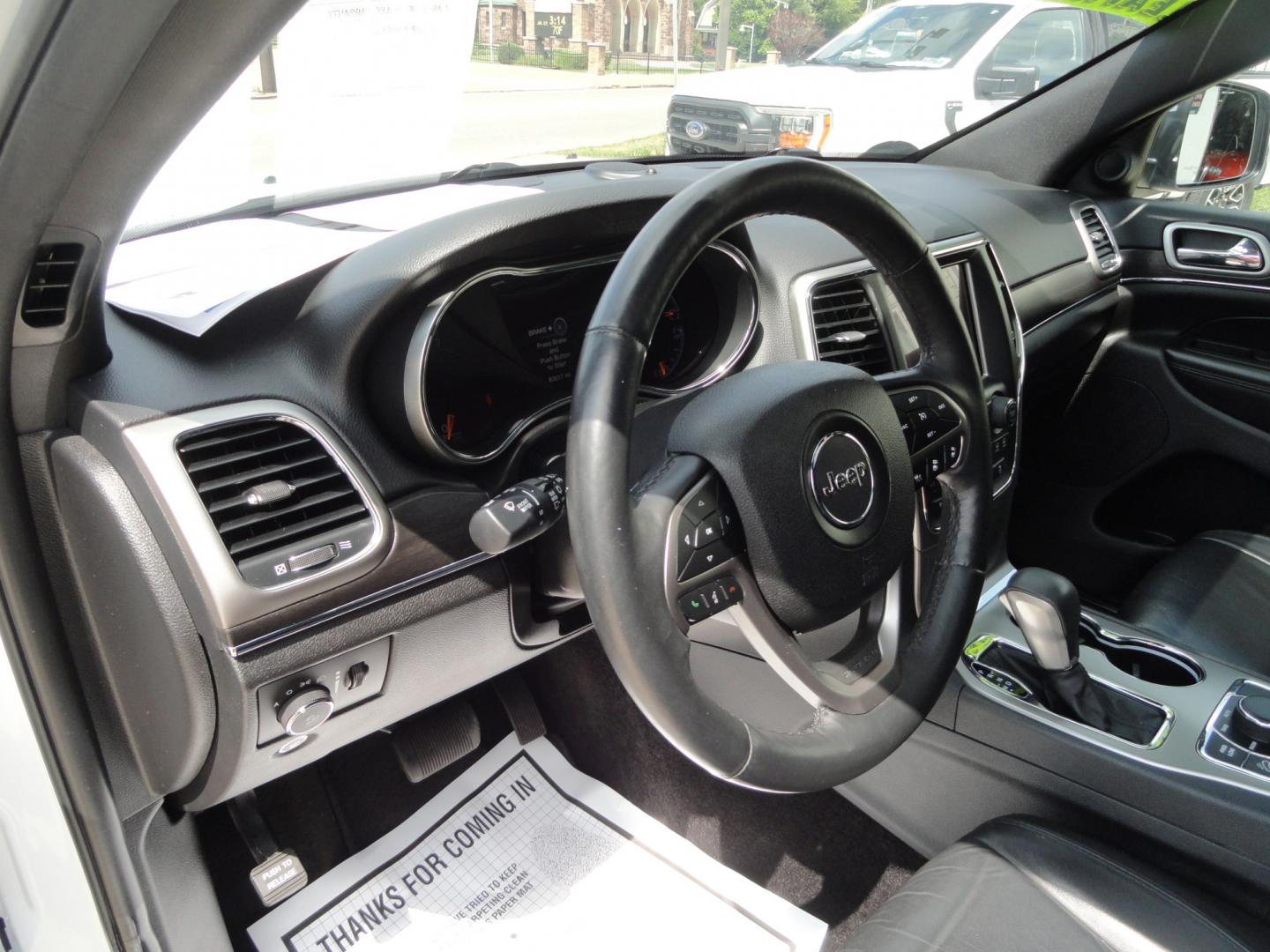 2018 Bright White /Jet Black Jeep Grand Cherokee Limited 4WD (1C4RJFBT2JC) with an 5.7L V8 OHV 16V engine, 8 SPEED AUTOMATIC transmission, located at 827 W 26th Street, Erie, PA, 16508, (814) 455-3401, 42.105431, -80.090942 - Thanks for looking at our two-owner accident and rust-free recent arrival. This is the Limited model with the hard-to-find HEMI 5.7 V-8 engine, four-wheel drive, dual power heated front seats, leather seating areas, back up camera, navigation, power sunroof, power lift gate, remote start, keyless en- Photo#25